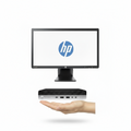 HP monitor and small form factor PC on a white background